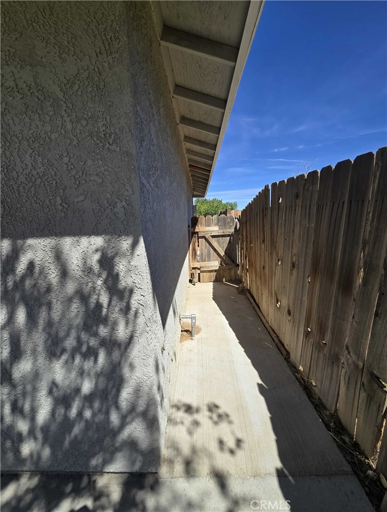 22909 Eyota Road Apple Valley, CA 92308 - Photo 16 of 18 a view of balcony with wooden floor