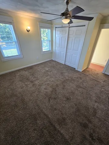 a view of a room with rack and toys