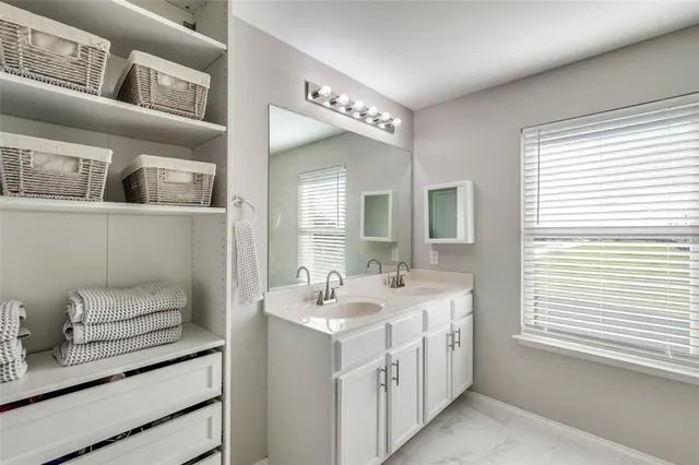 a bathroom with a tub and a shower