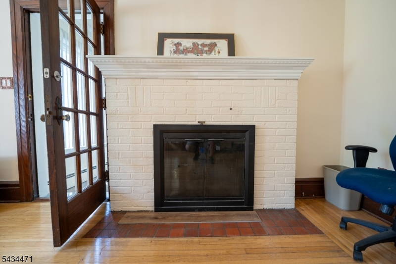 192 Lincoln Road Phillipsburg, NJ 08865 - Photo 18 of 50 a living room with furniture and a fireplace