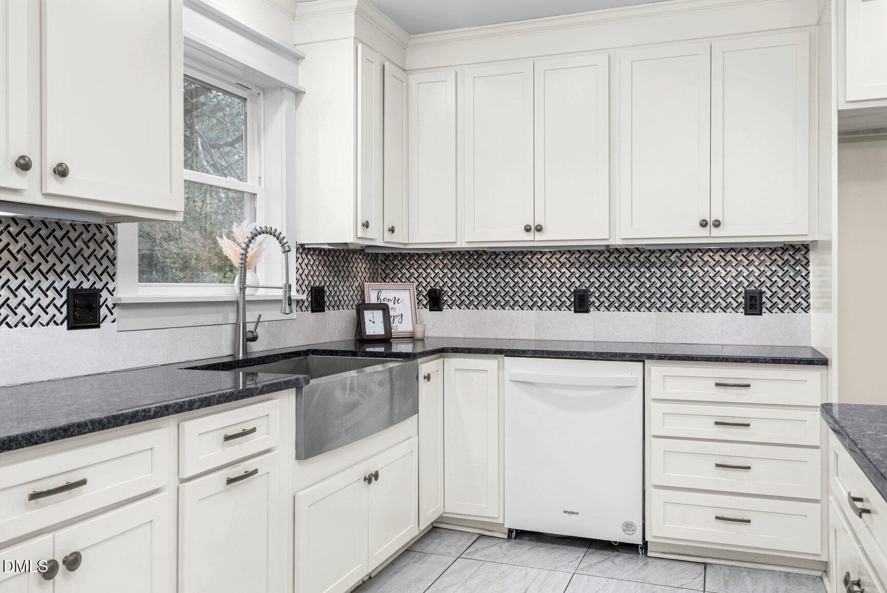 2141 McNair Road Tarboro, NC 27886 - Photo 13 of 55 a kitchen with granite countertop white cabinets and white appliances