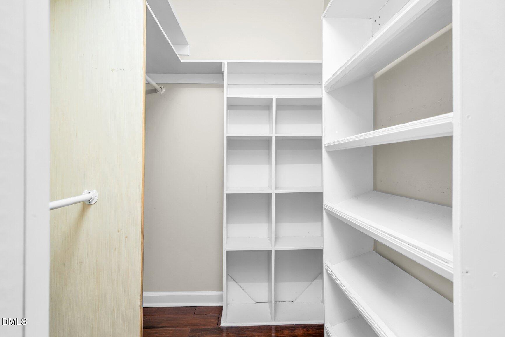 2141 McNair Road Tarboro, NC 27886 - Photo 21 of 55 a view of walk in closet with empty racks