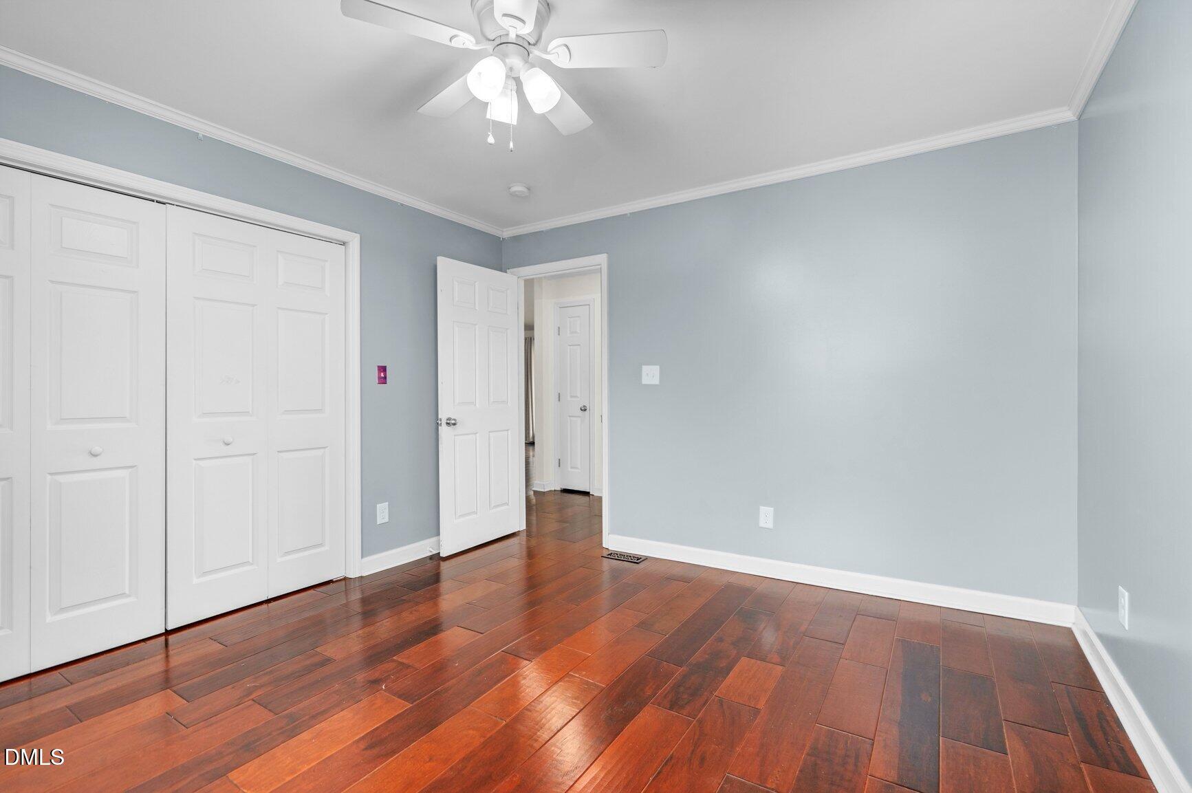 2141 McNair Road Tarboro, NC 27886 - Photo 22 of 55 a view of an empty room with wooden floor