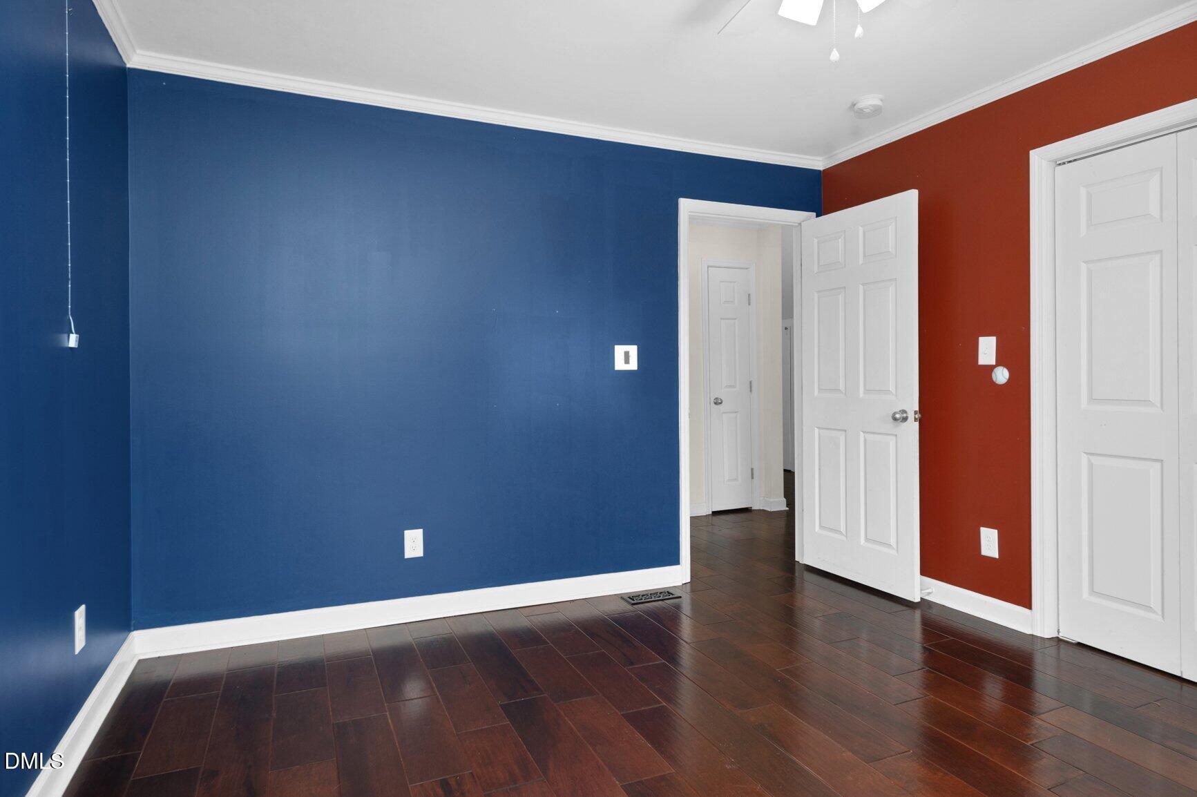 2141 McNair Road Tarboro, NC 27886 - Photo 26 of 55 a view of an empty room with wooden floor