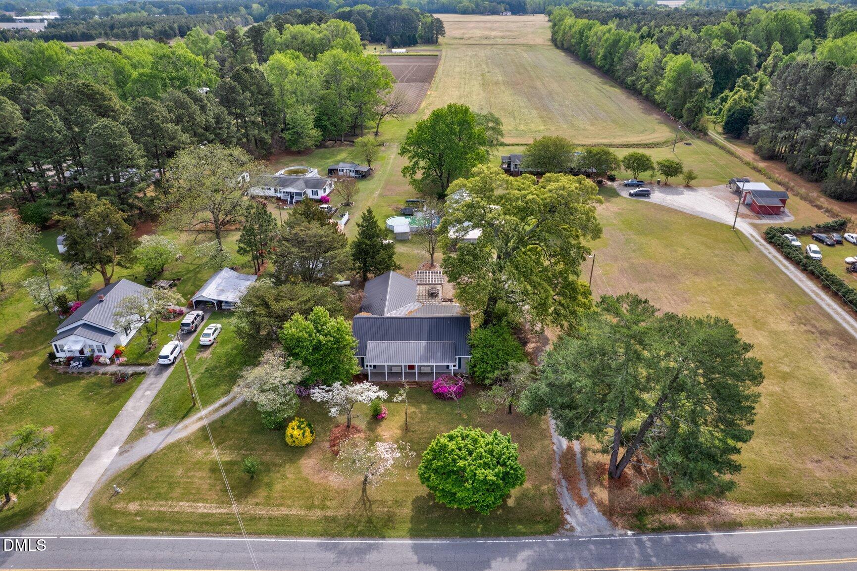 2141 McNair Road Tarboro, NC 27886 - Photo 50 of 55 an aerial view of residential houses with outdoor space