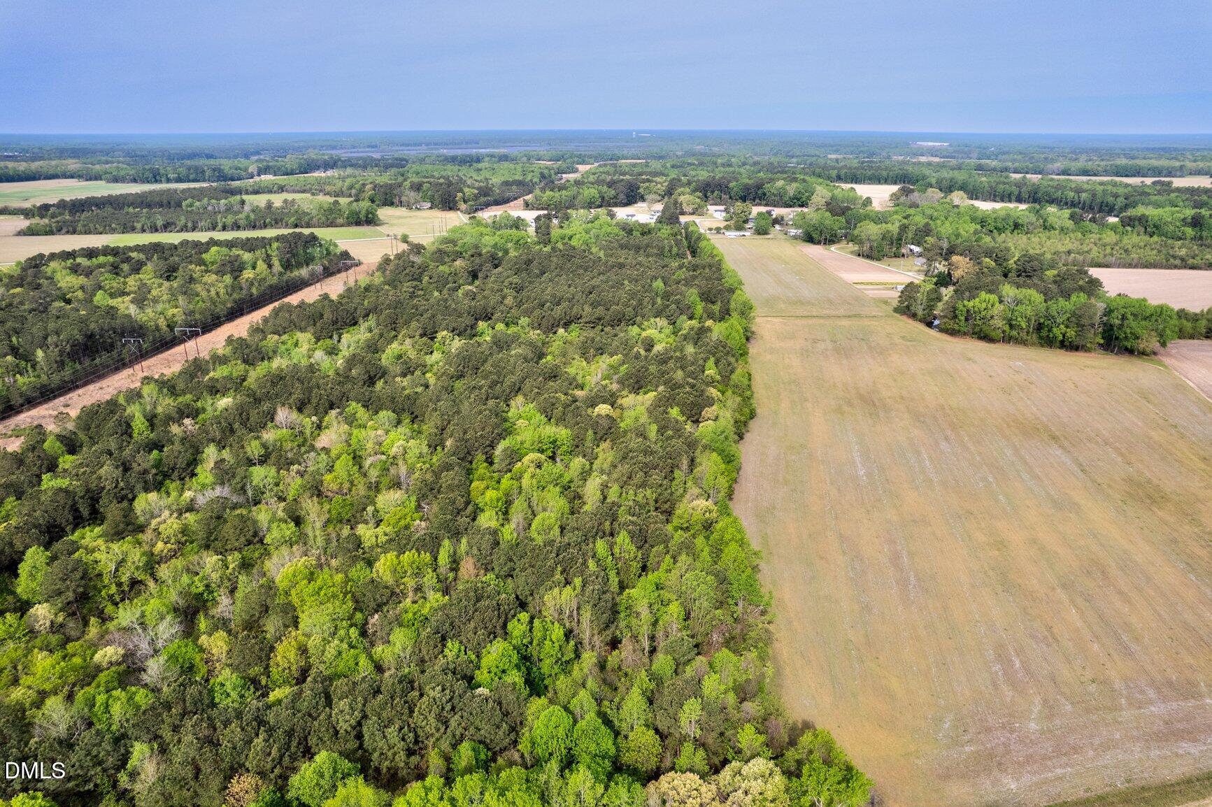 2141 McNair Road Tarboro, NC 27886 - Photo 54 of 55 a view of a city and an ocean beach