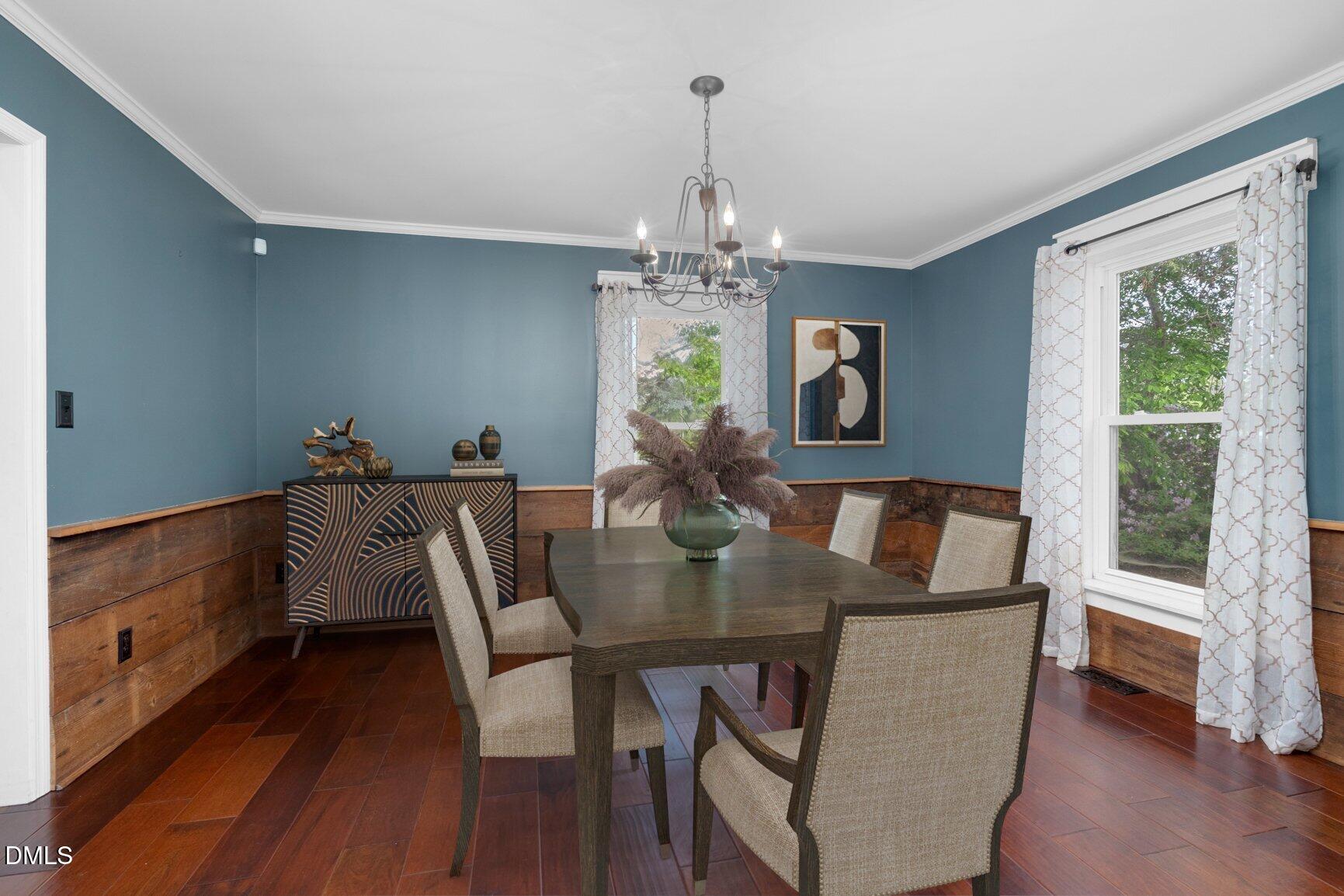 2141 McNair Road Tarboro, NC 27886 - Photo 7 of 55 a view of a dining room with furniture window and wooden floor