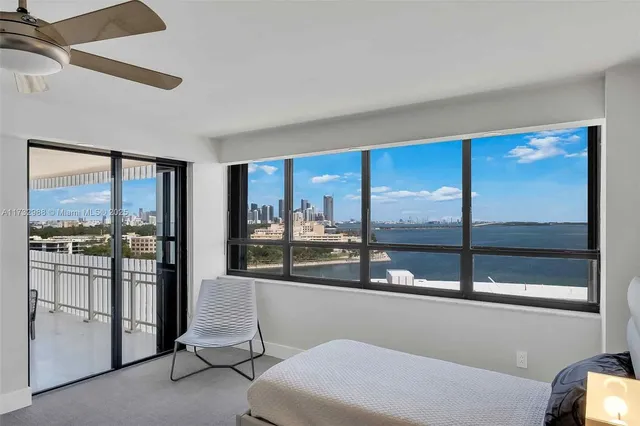 a view of a living room with a large window