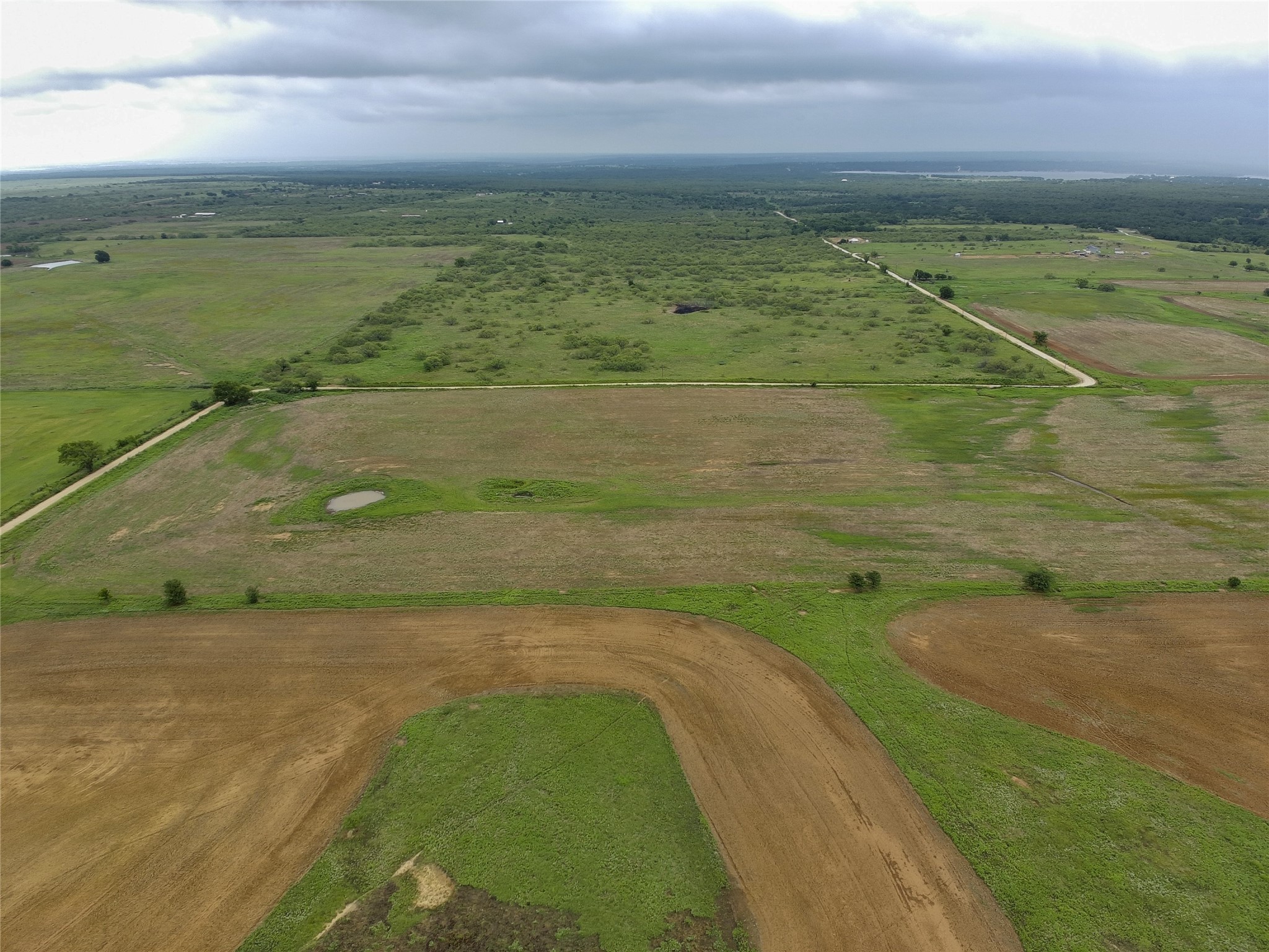 0 Cunningham Road Nocona, TX 76255 - Photo 7 of 10 a view of a field with an ocean view
