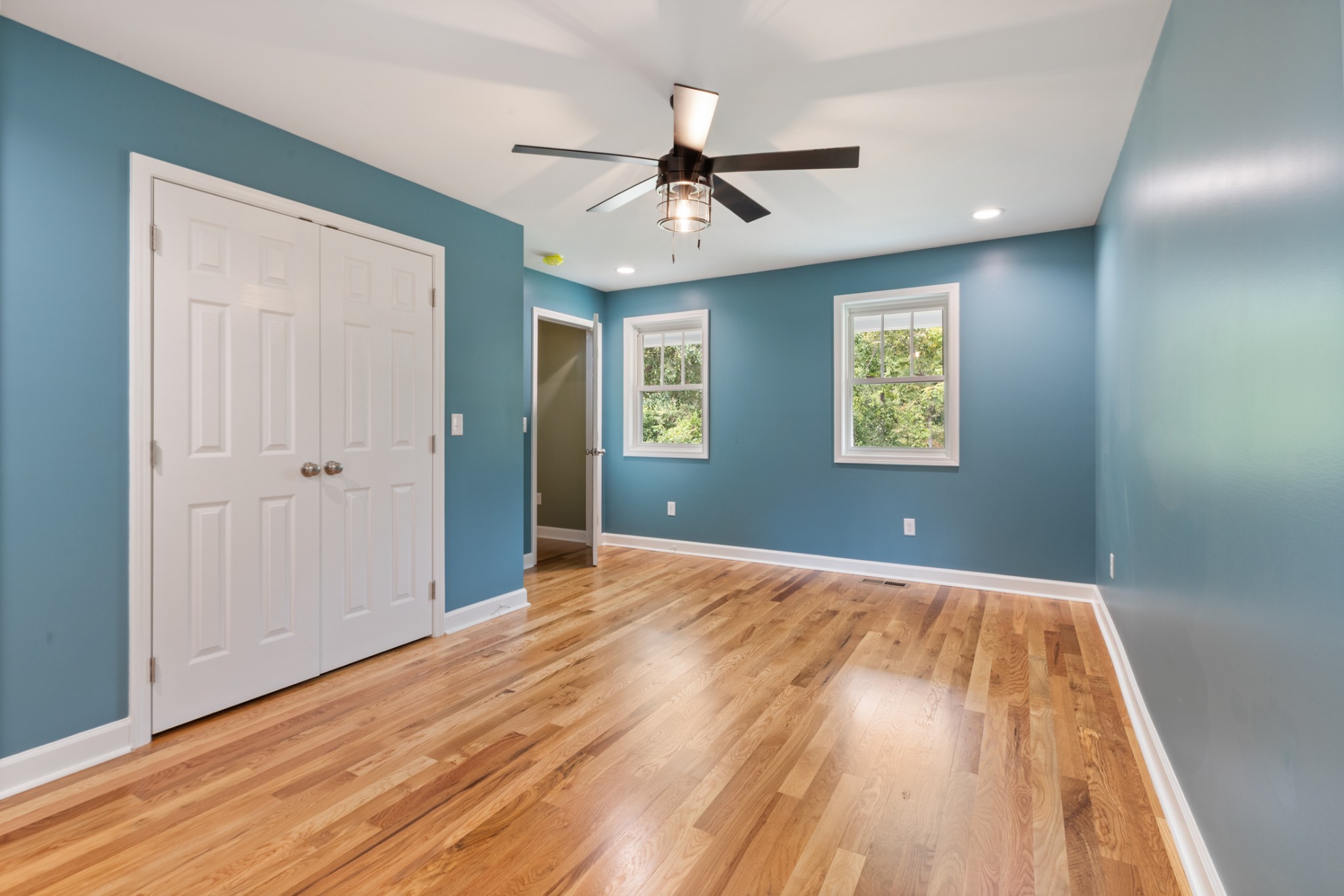 260 Old Highway 48 Charlotte, TN 37036 - Photo 16 of 71 wooden floor in an empty room with a window