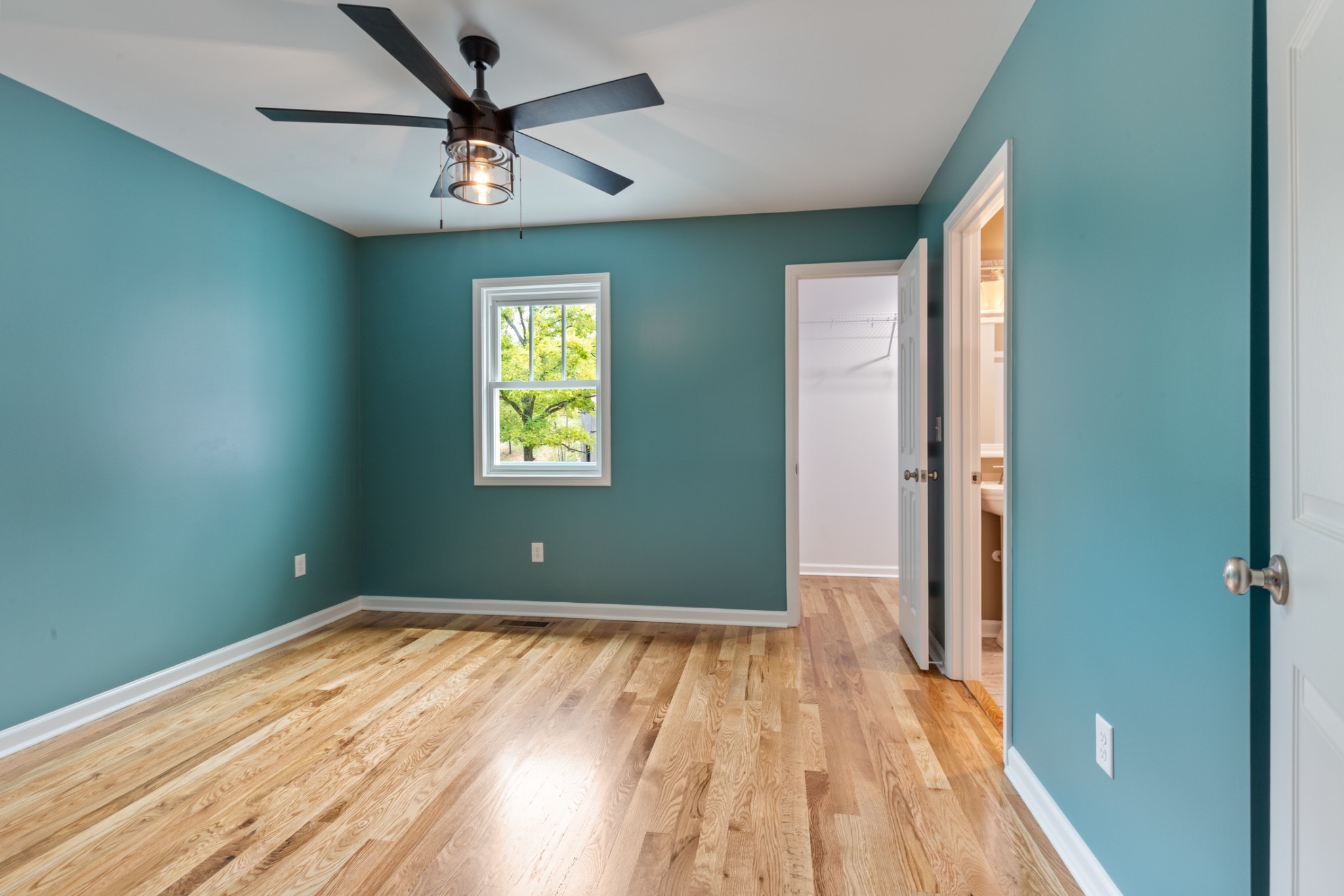 260 Old Highway 48 Charlotte, TN 37036 - Photo 20 of 71 wooden floor in an empty room with a window