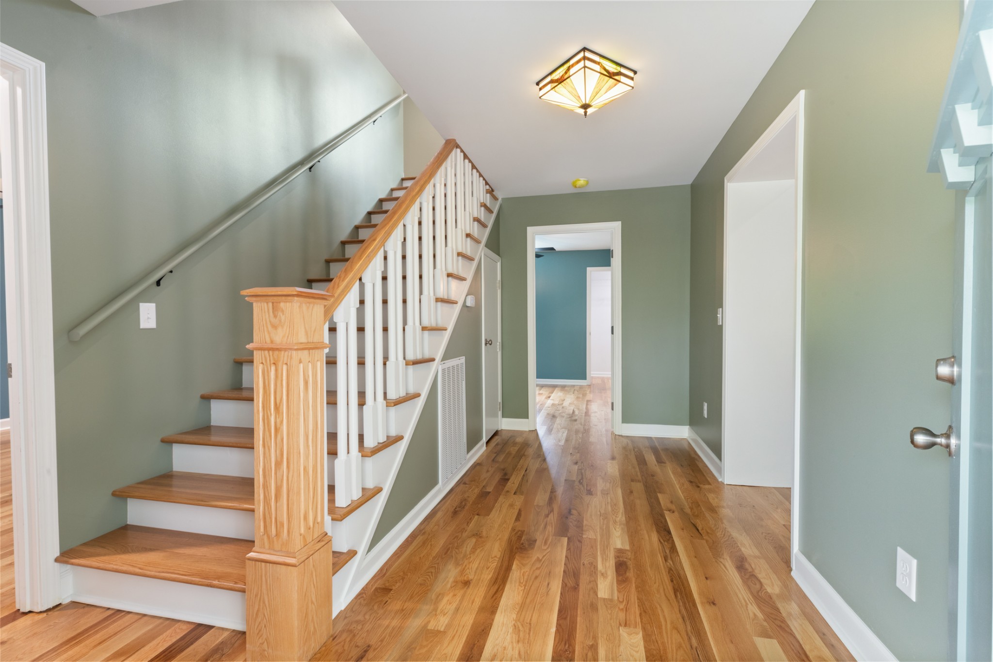260 Old Highway 48 Charlotte, TN 37036 - Photo 3 of 71 a view of a hallway with wooden floor and staircase