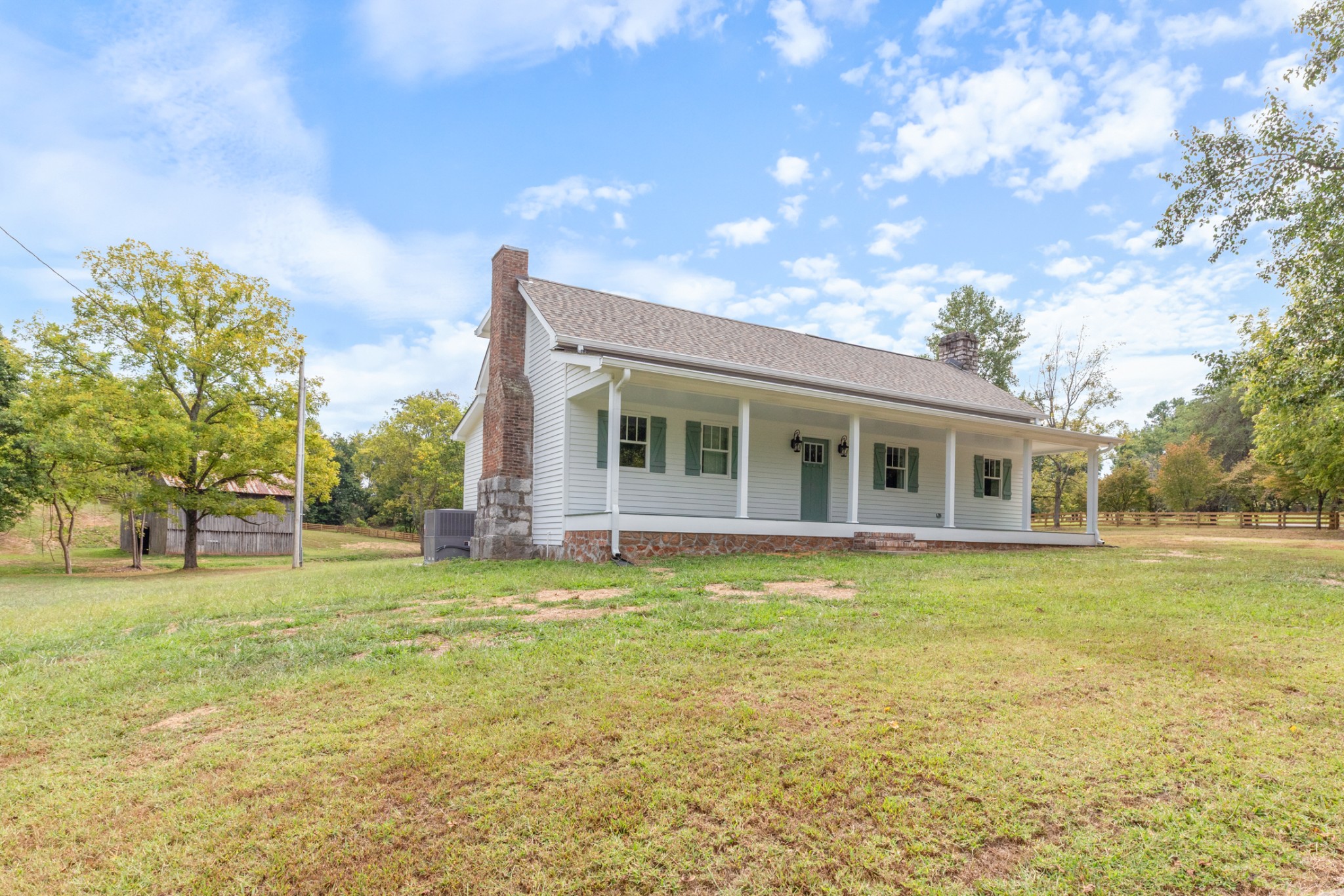 260 Old Highway 48 Charlotte, TN 37036 - Photo 33 of 71 a view of a house with a big yard and potted plants
