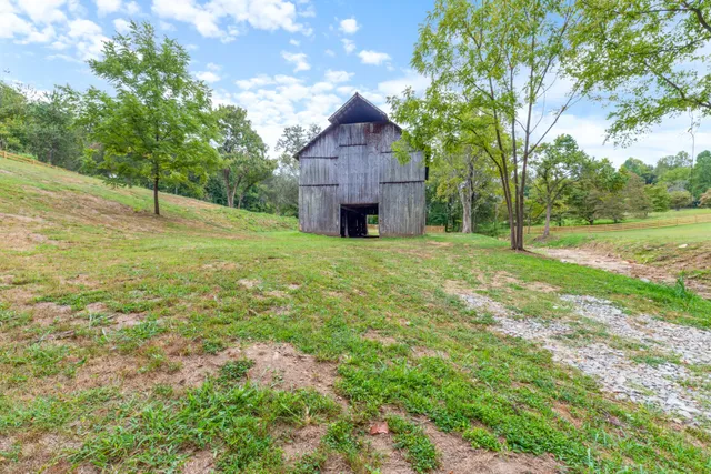 an aerial view of residential house with outdoor space
