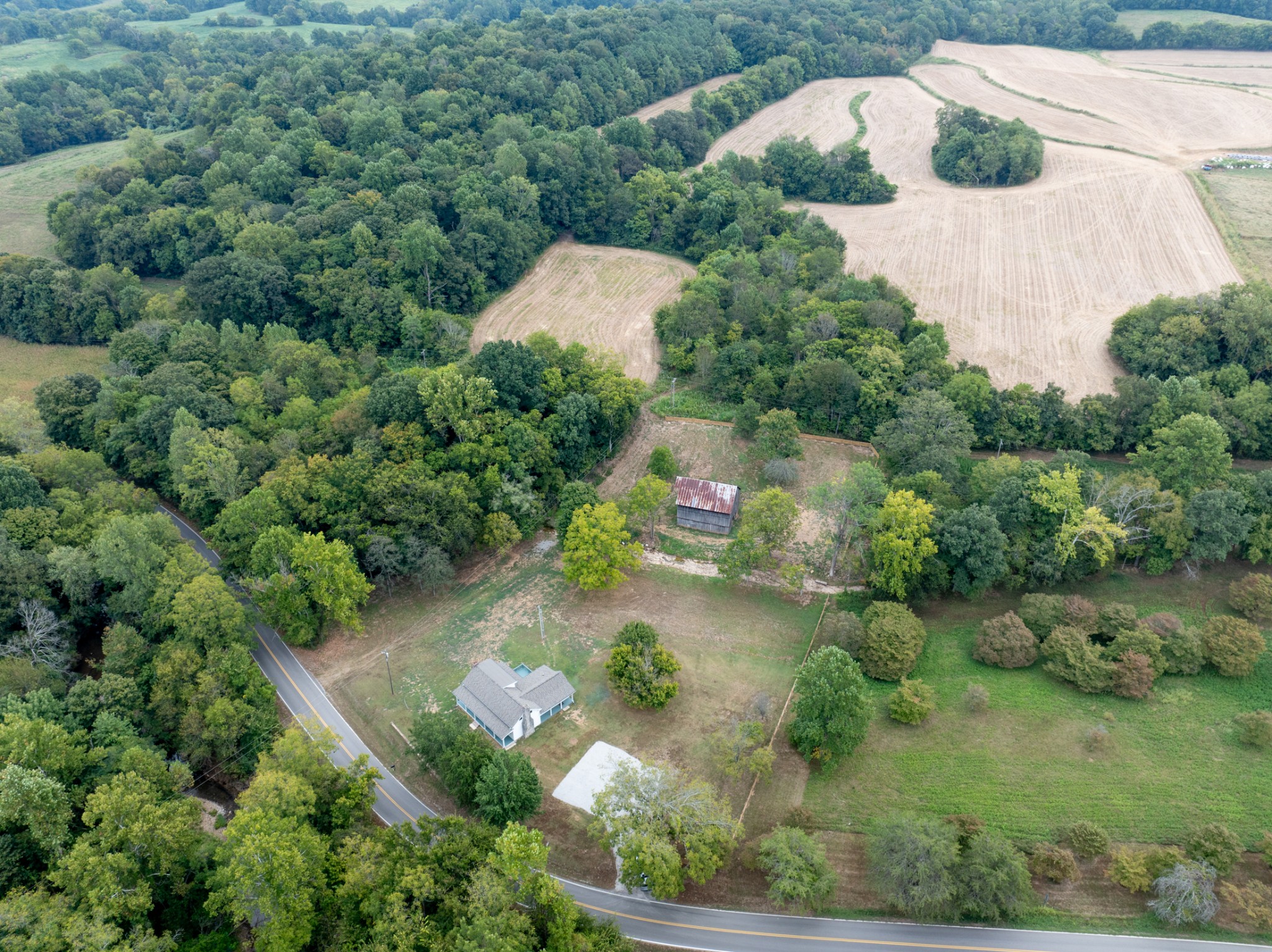 260 Old Highway 48 Charlotte, TN 37036 - Photo 60 of 71 an aerial view of a house with a yard and lake view