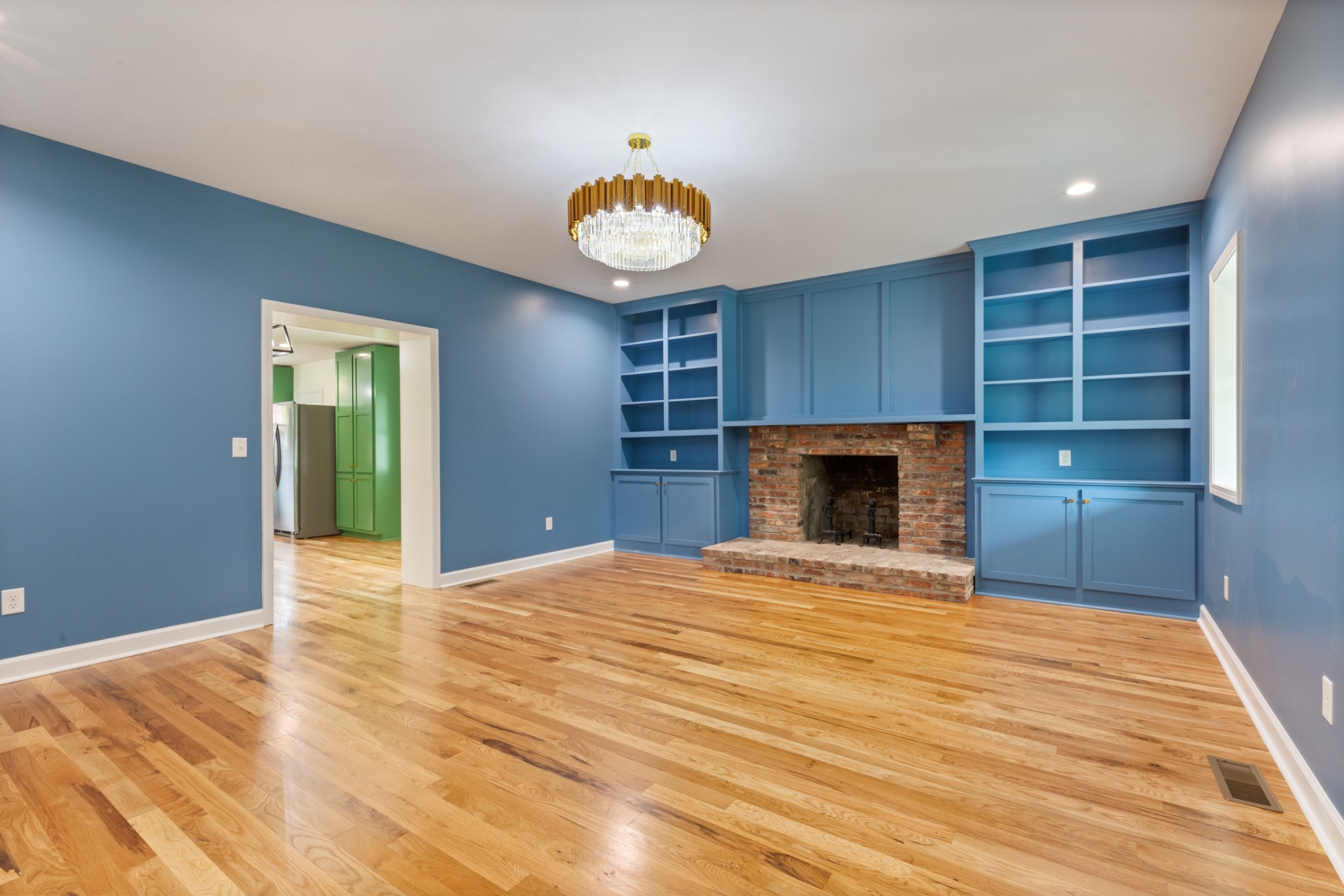 260 Old Highway 48 Charlotte, TN 37036 - Photo 6 of 71 a view of an empty room with a fireplace and a window