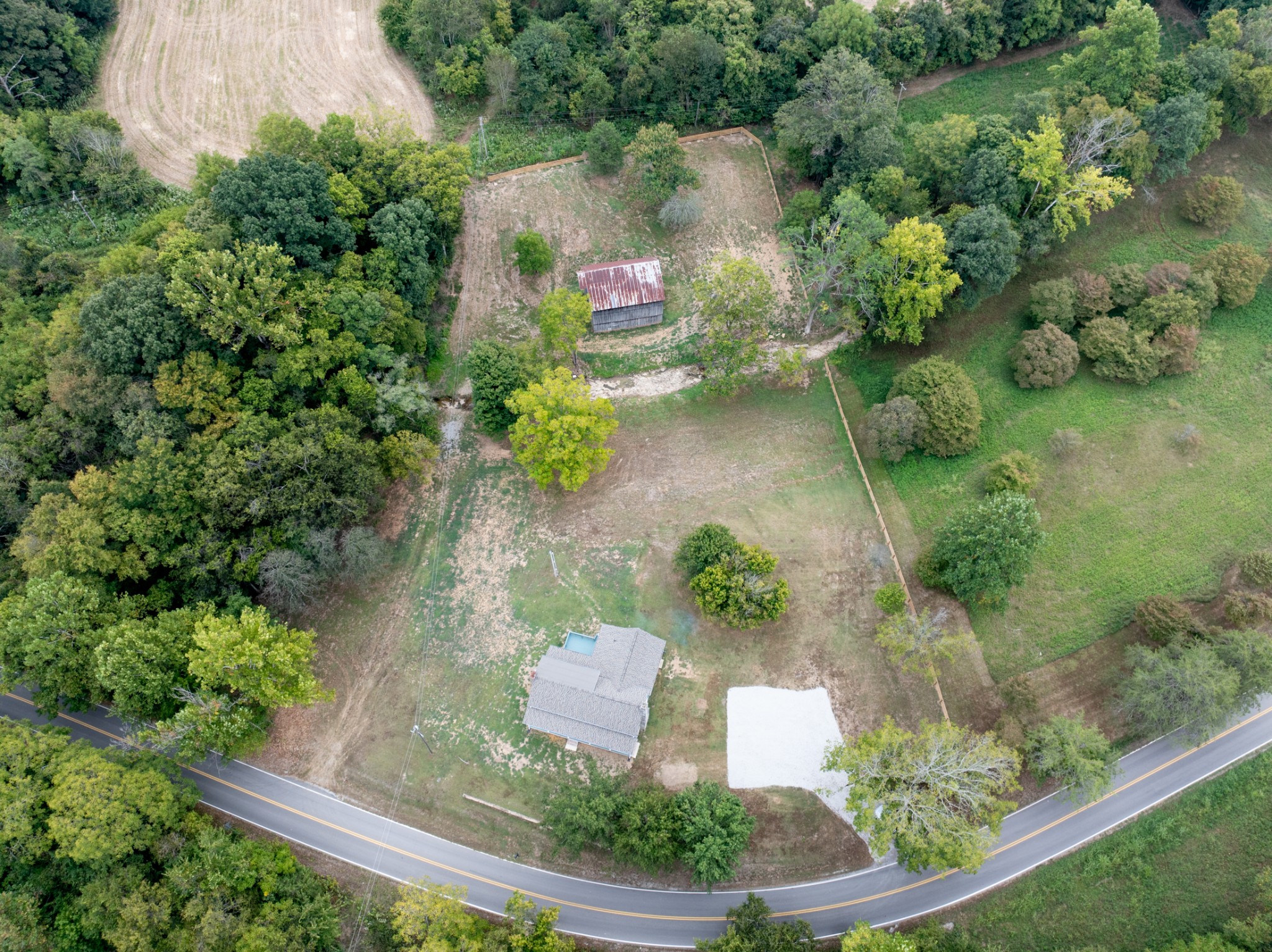 260 Old Highway 48 Charlotte, TN 37036 - Photo 63 of 71 an aerial view of a house with a yard and lake view