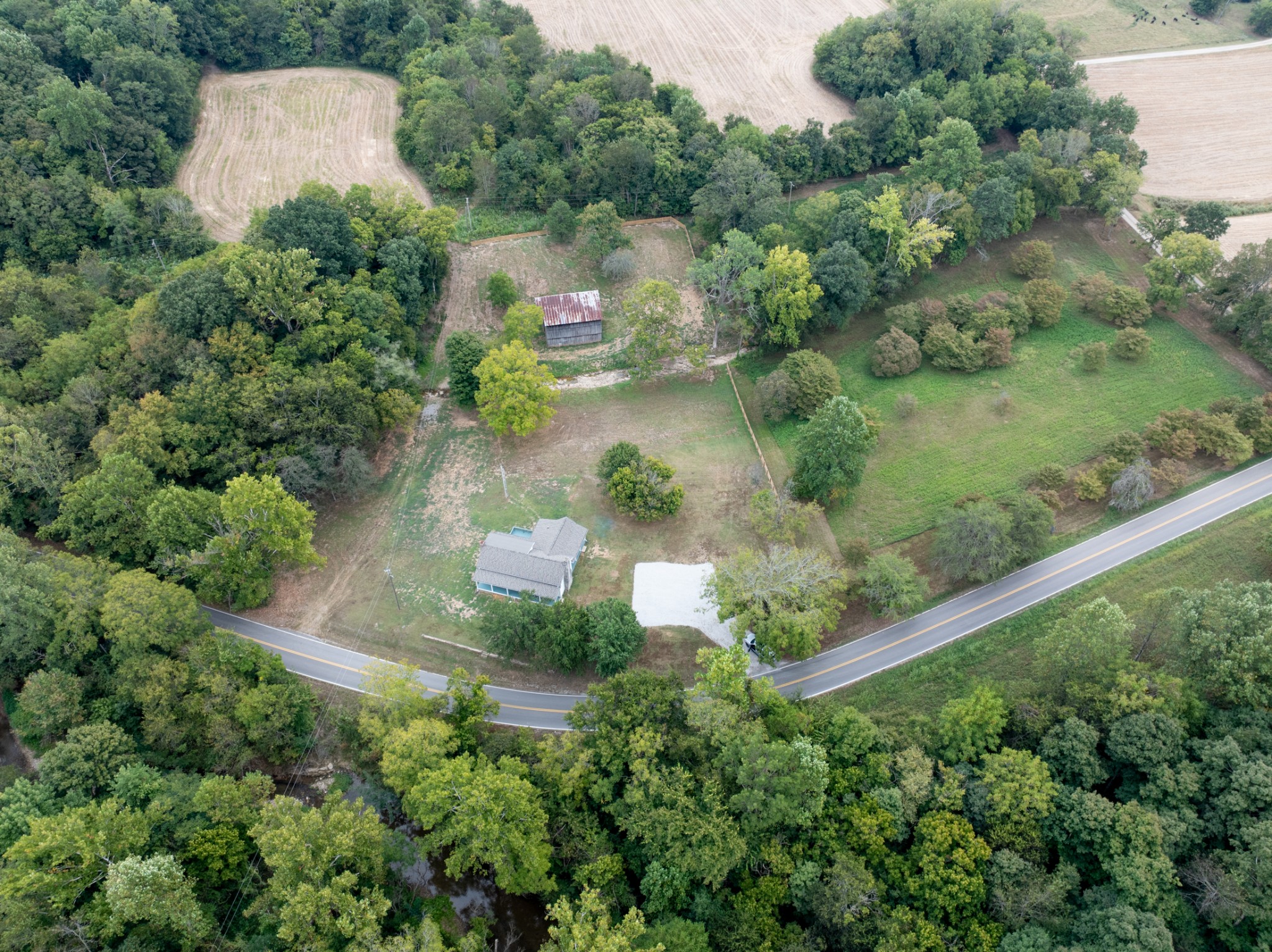 260 Old Highway 48 Charlotte, TN 37036 - Photo 64 of 71 an aerial view of a house with a yard and lake view