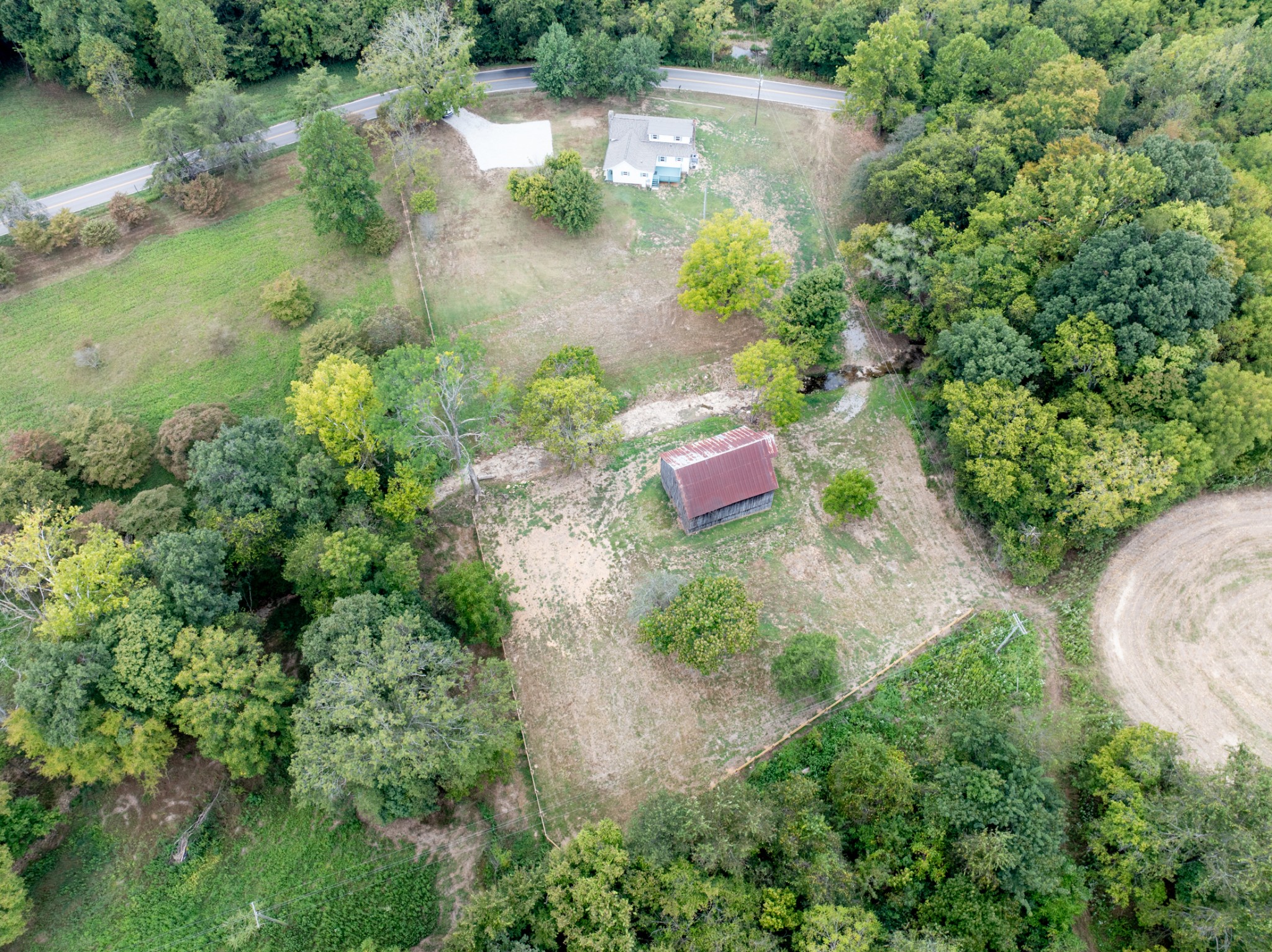 260 Old Highway 48 Charlotte, TN 37036 - Photo 70 of 71 an aerial view of a house with a yard