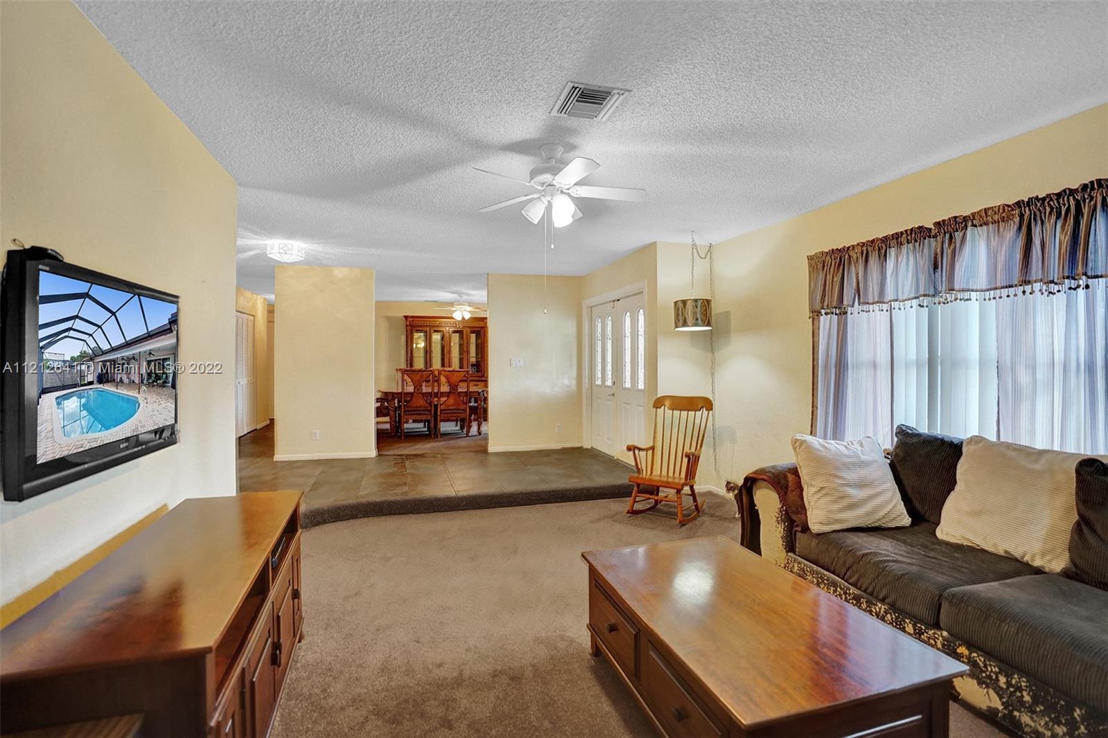 7420 Southwest 15th Street Plantation, FL 33317 - Photo 12 of 60 a living room with furniture and wooden floor