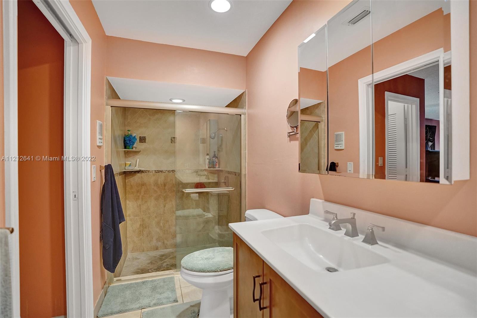 7420 Southwest 15th Street Plantation, FL 33317 - Photo 49 of 60 a bathroom with a sink toilet and shower