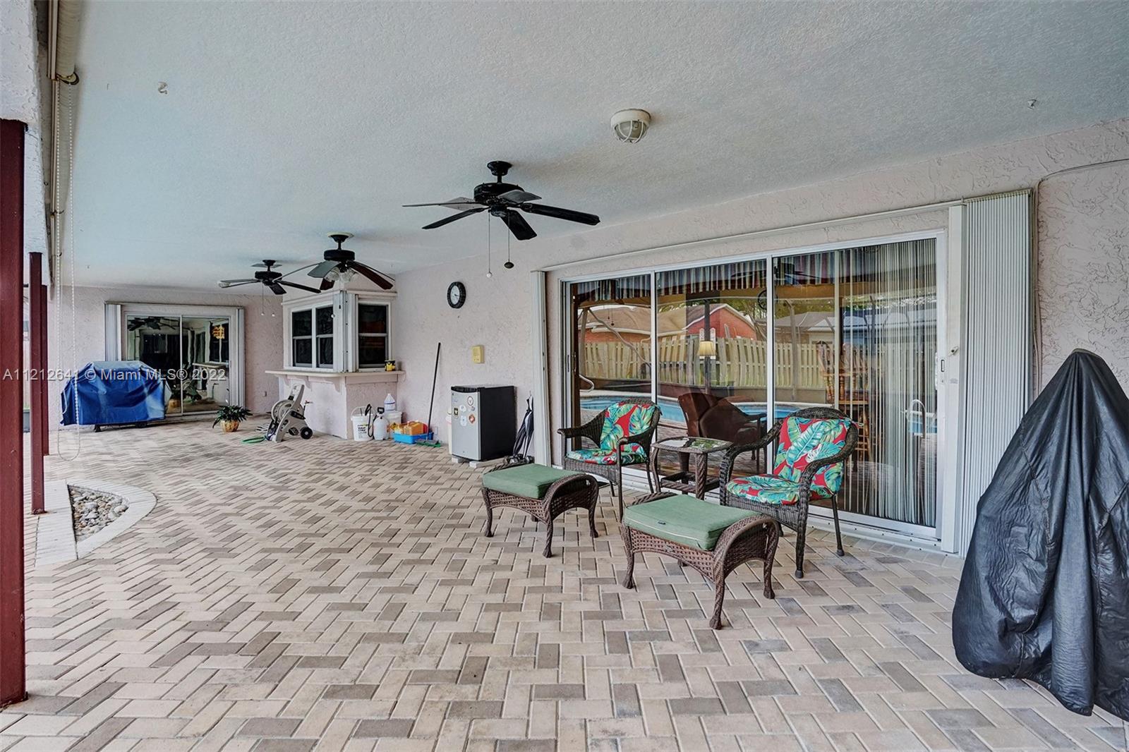 7420 Southwest 15th Street Plantation, FL 33317 - Photo 59 of 60 a living room filled with furniture