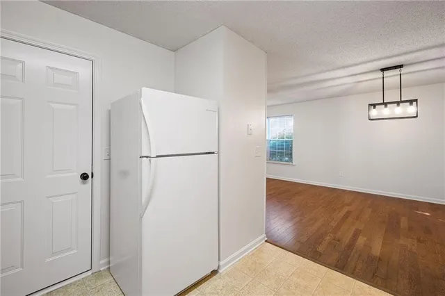 a view of a storage & utility room with wooden floor