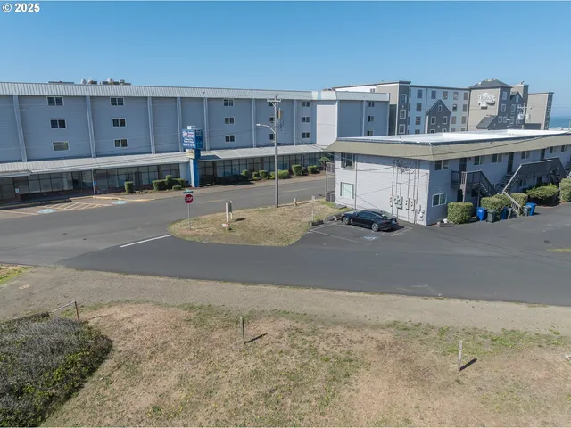 a kitchen with a cabinets and chandelier