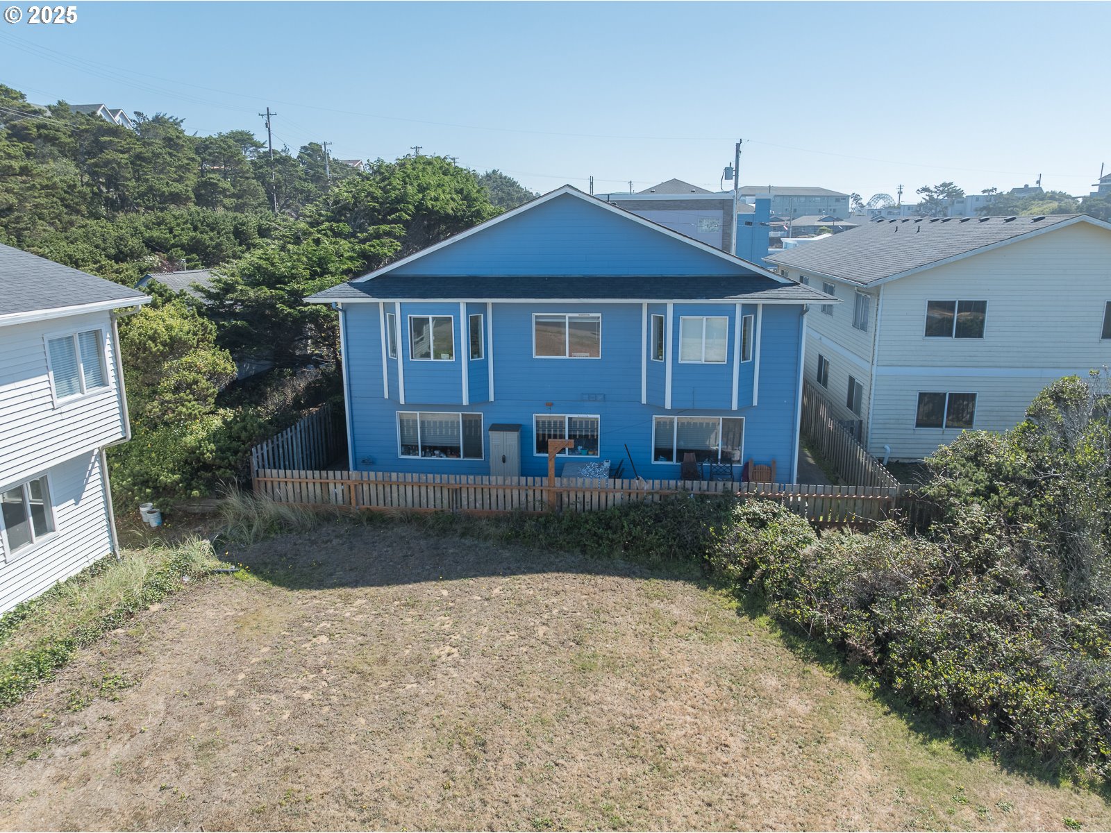 Undisclosed Address Newport, OR 97365 - Photo 16 of 16 a front view of a house with a yard