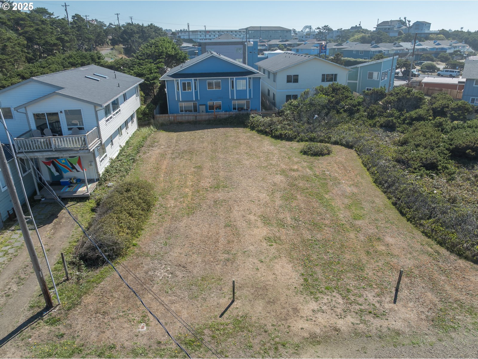 Undisclosed Address Newport, OR 97365 - Photo 2 of 16 a front view of a house with a yard
