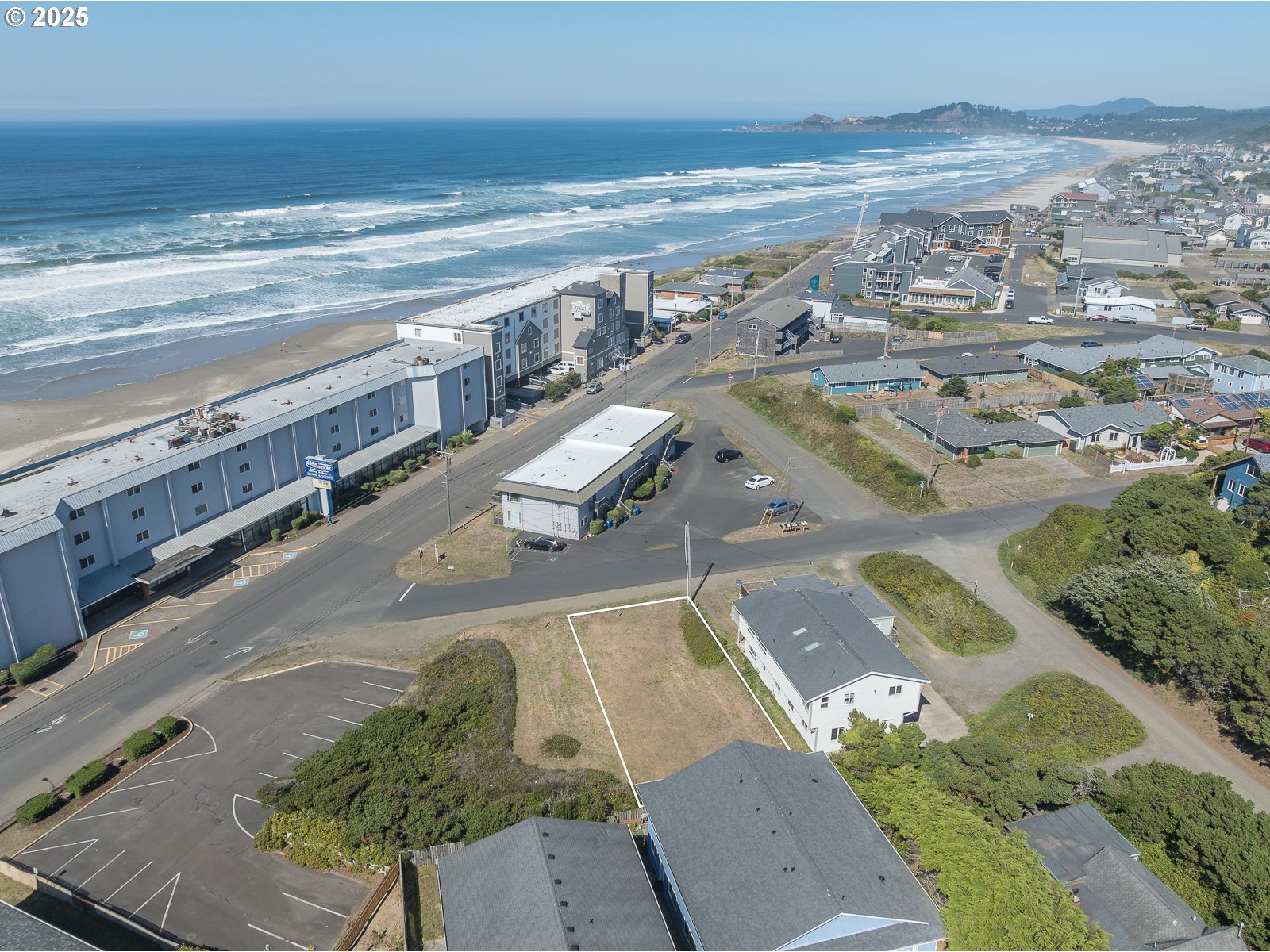 Undisclosed Address Newport, OR 97365 - Photo 10 of 16 a view of an ocean and beach