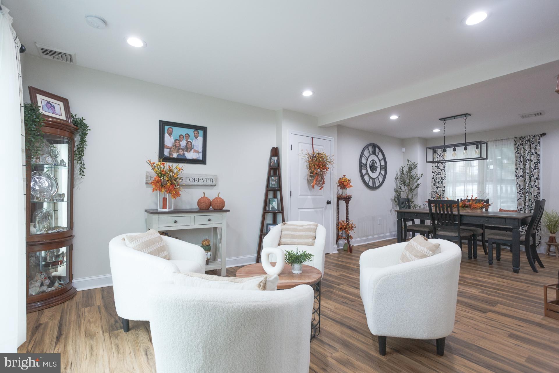 6 Hickory Lane Levittown, PA 19055 - Photo 9 of 32 a living room with furniture and a wooden floor