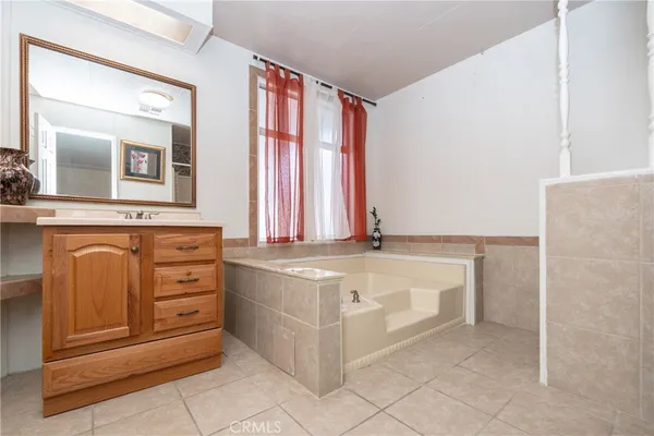 a bathroom with a toilet and shower