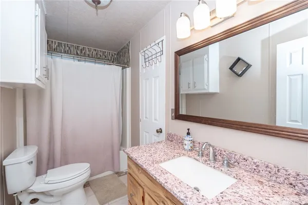 a view of a livingroom with furniture