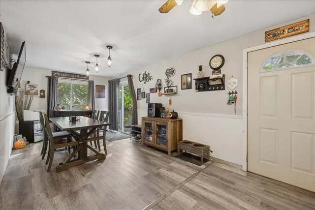 a view of a livingroom with furniture and a window
