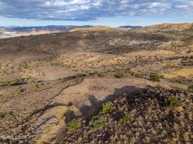 a view of mountain view with trees