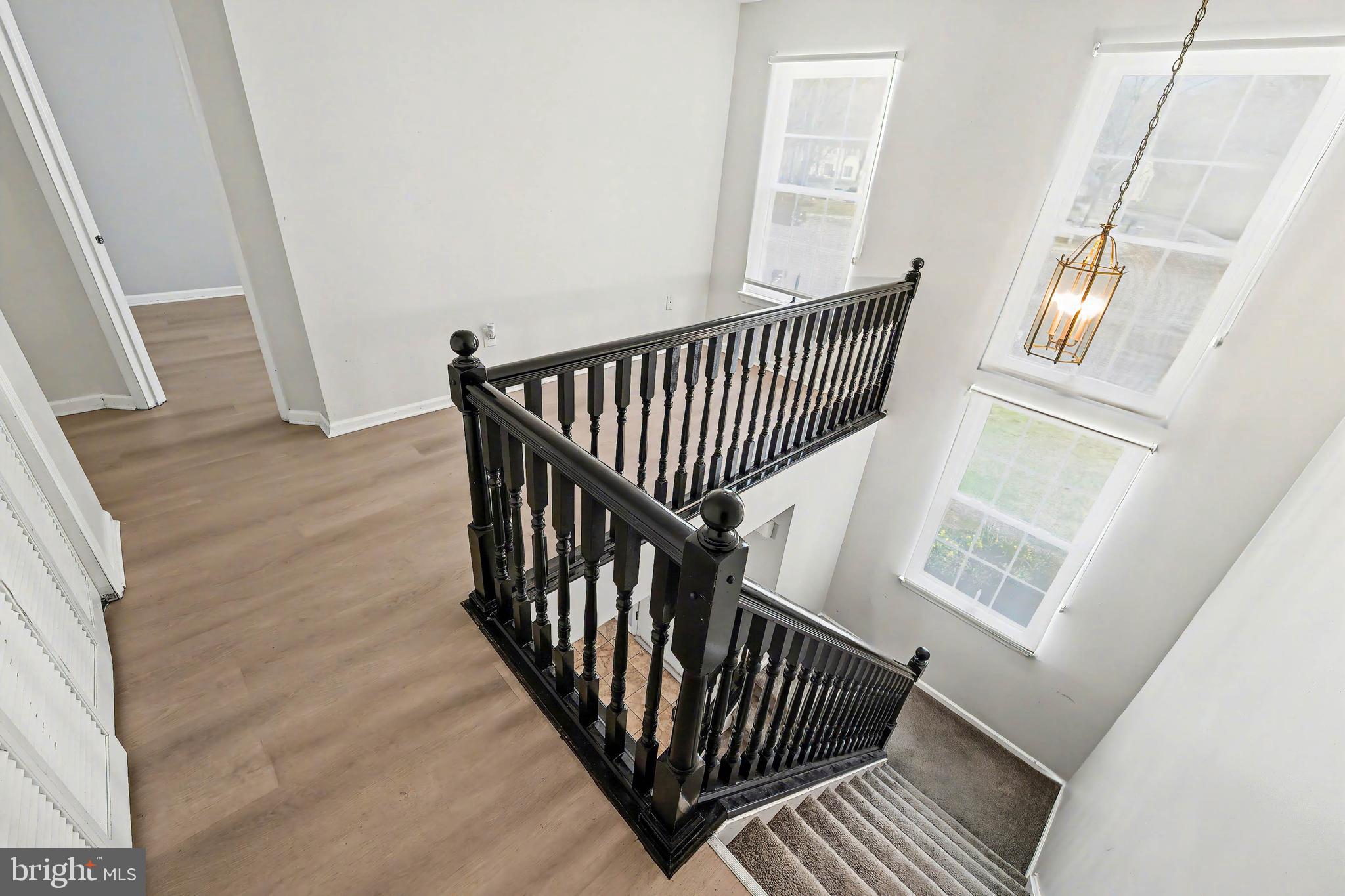 775 Quail Place Deptford, NJ 08096 - Photo 11 of 17 a view of entryway with wooden floor