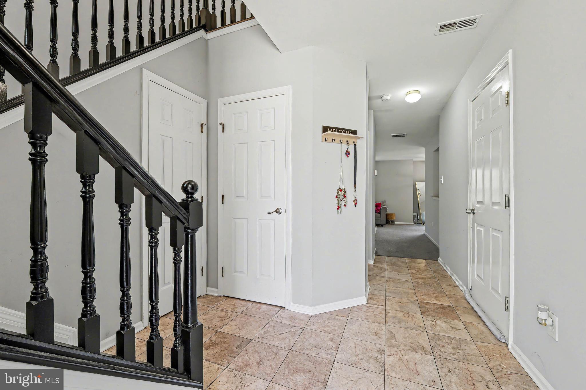 775 Quail Place Deptford, NJ 08096 - Photo 3 of 17 a view of a hallway with a door