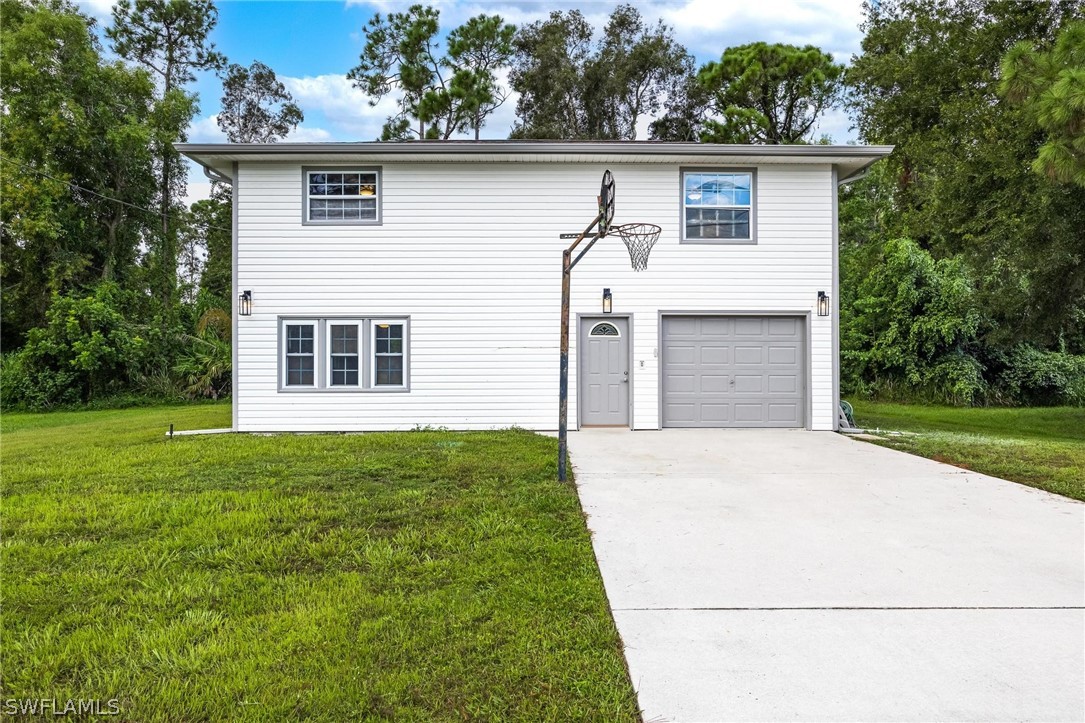 18804 Matanzas Road Fort Myers, FL 33967 - Photo 1 of 19 a view of a backyard of the house