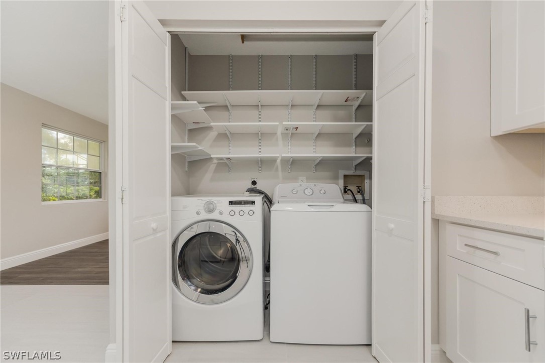 18804 Matanzas Road Fort Myers, FL 33967 - Photo 18 of 19 a utility room with washing machine