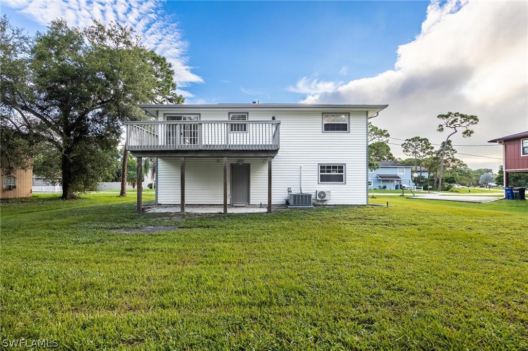 18804 Matanzas Road Fort Myers, FL 33967 - Photo 19 of 19 a view of a house with a garden