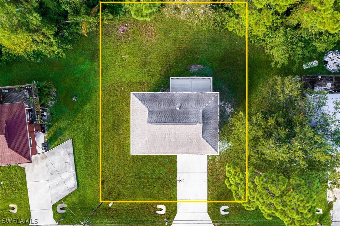 18804 Matanzas Road Fort Myers, FL 33967 - Photo 2 of 19 an aerial view of a house with a yard