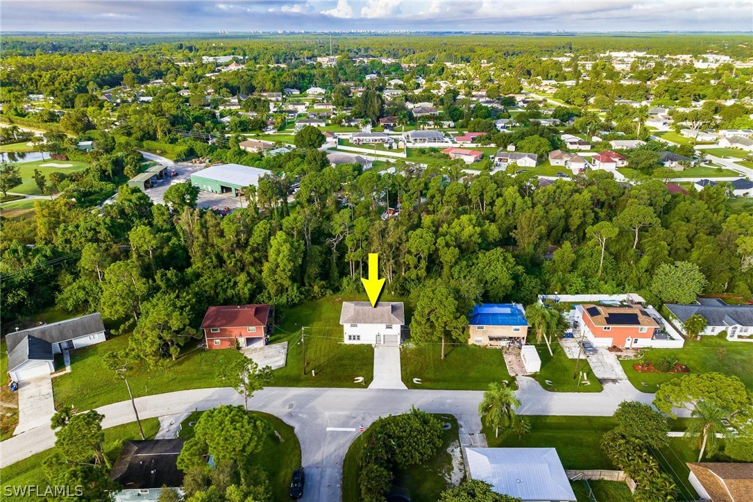 18804 Matanzas Road Fort Myers, FL 33967 - Photo 3 of 19 an aerial view of residential houses with outdoor space and trees
