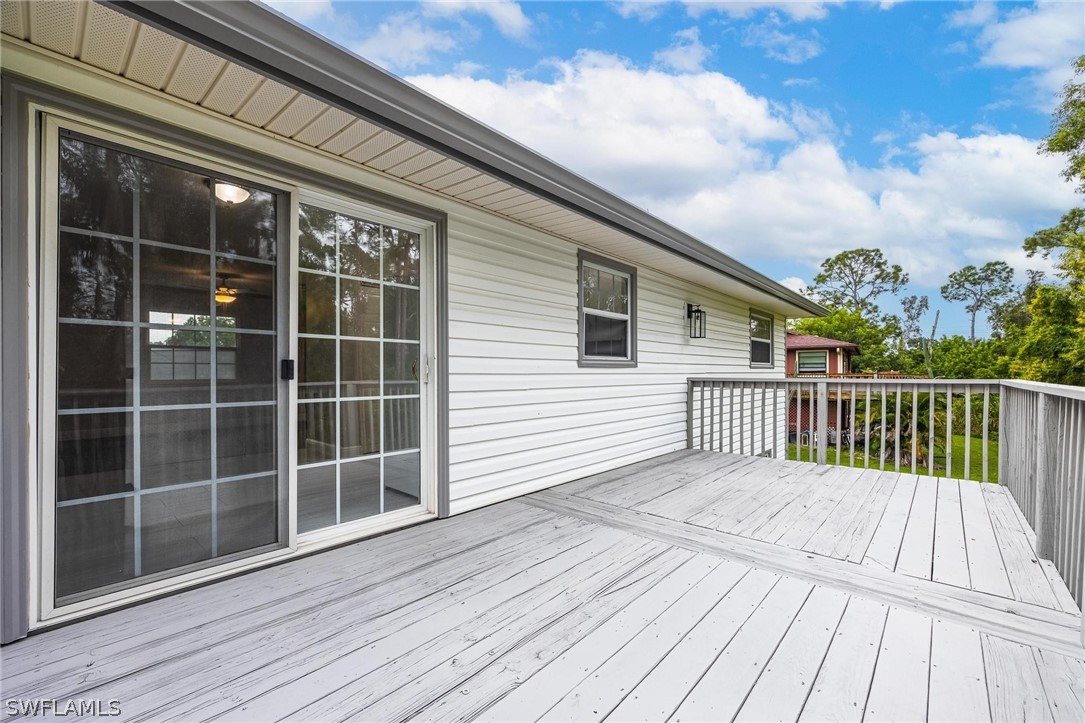 18804 Matanzas Road Fort Myers, FL 33967 - Photo 4 of 19 a view of a wooden deck