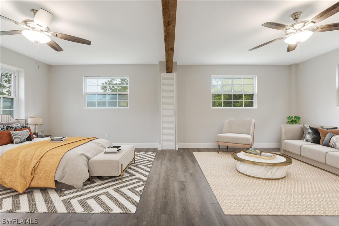 18804 Matanzas Road Fort Myers, FL 33967 - Photo 7 of 19 a bedroom with a bed and window