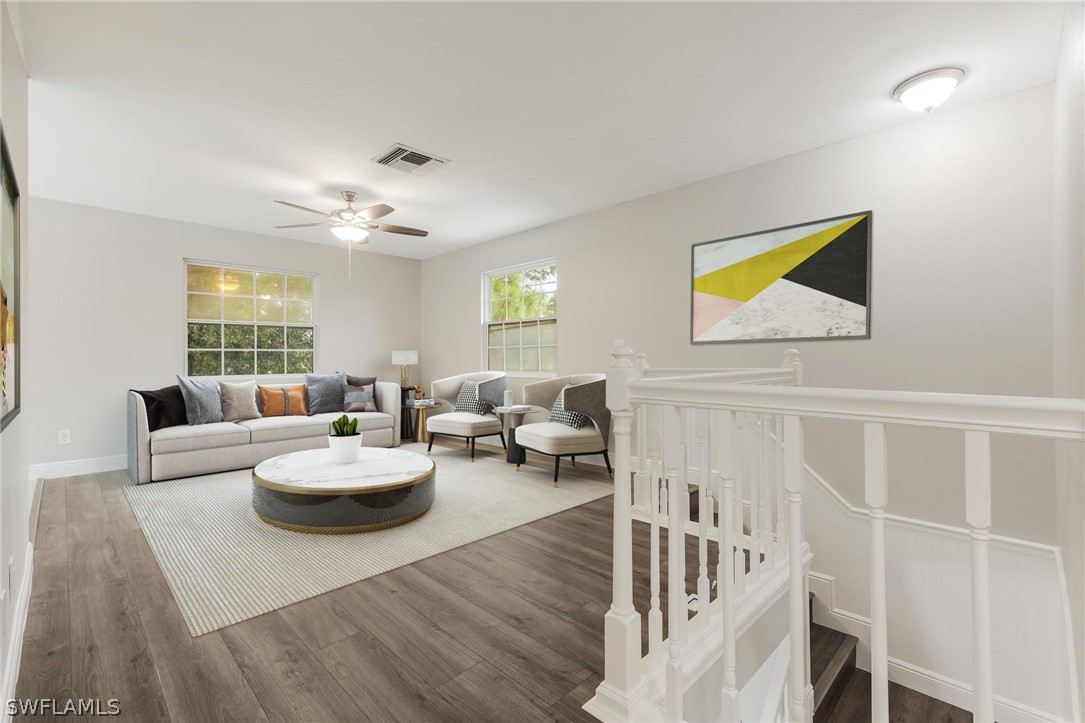 18804 Matanzas Road Fort Myers, FL 33967 - Photo 10 of 19 a living room with furniture and wooden floor