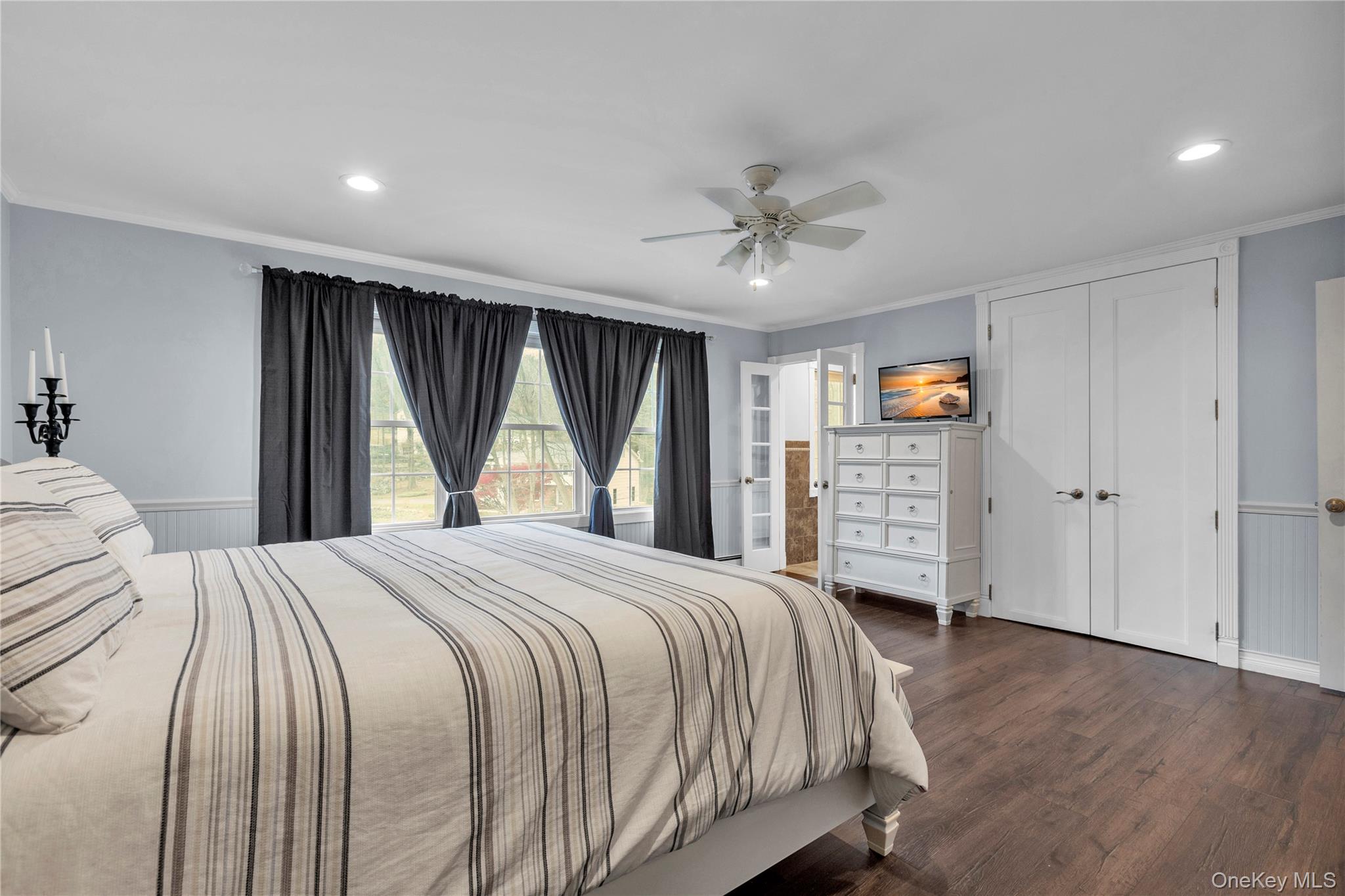 297 Church Road Putnam Valley, NY 10579 - Photo 20 of 42 a bedroom with a bed and a large window