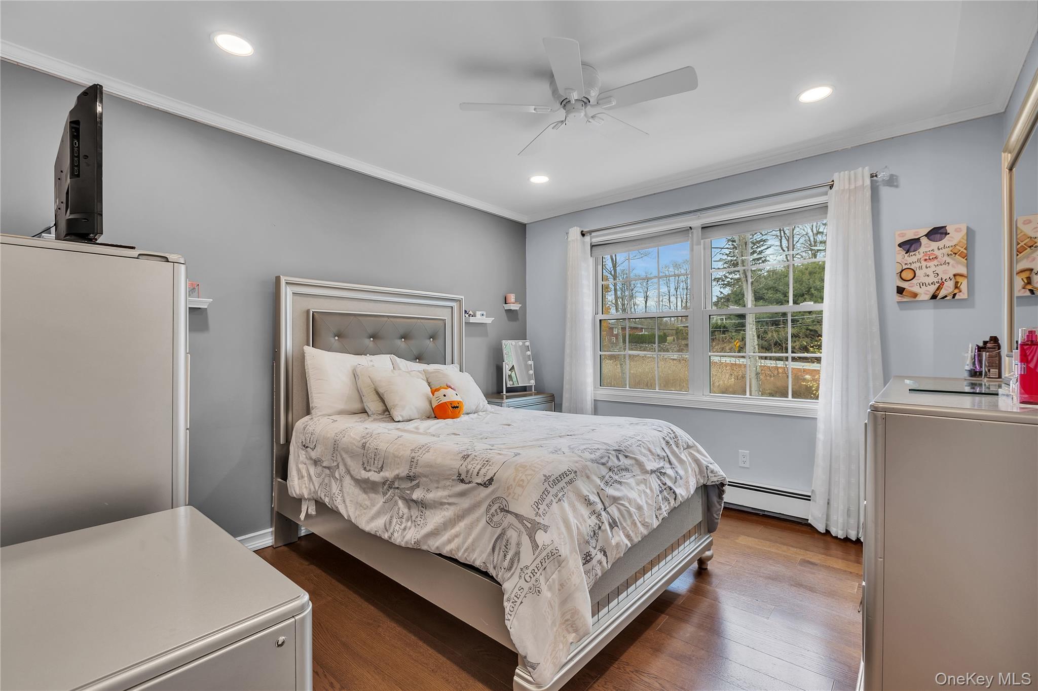 297 Church Road Putnam Valley, NY 10579 - Photo 22 of 42 Bedroom featuring dark wood-type flooring, ornamental molding, recessed lighting, a ceiling fan, and a baseboard radiator