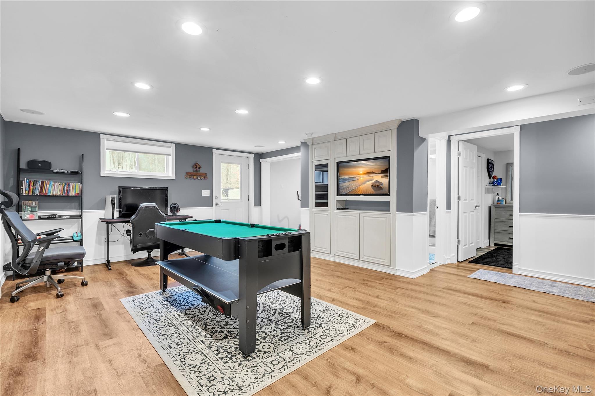 297 Church Road Putnam Valley, NY 10579 - Photo 26 of 42 a living room with furniture and a wooden floor