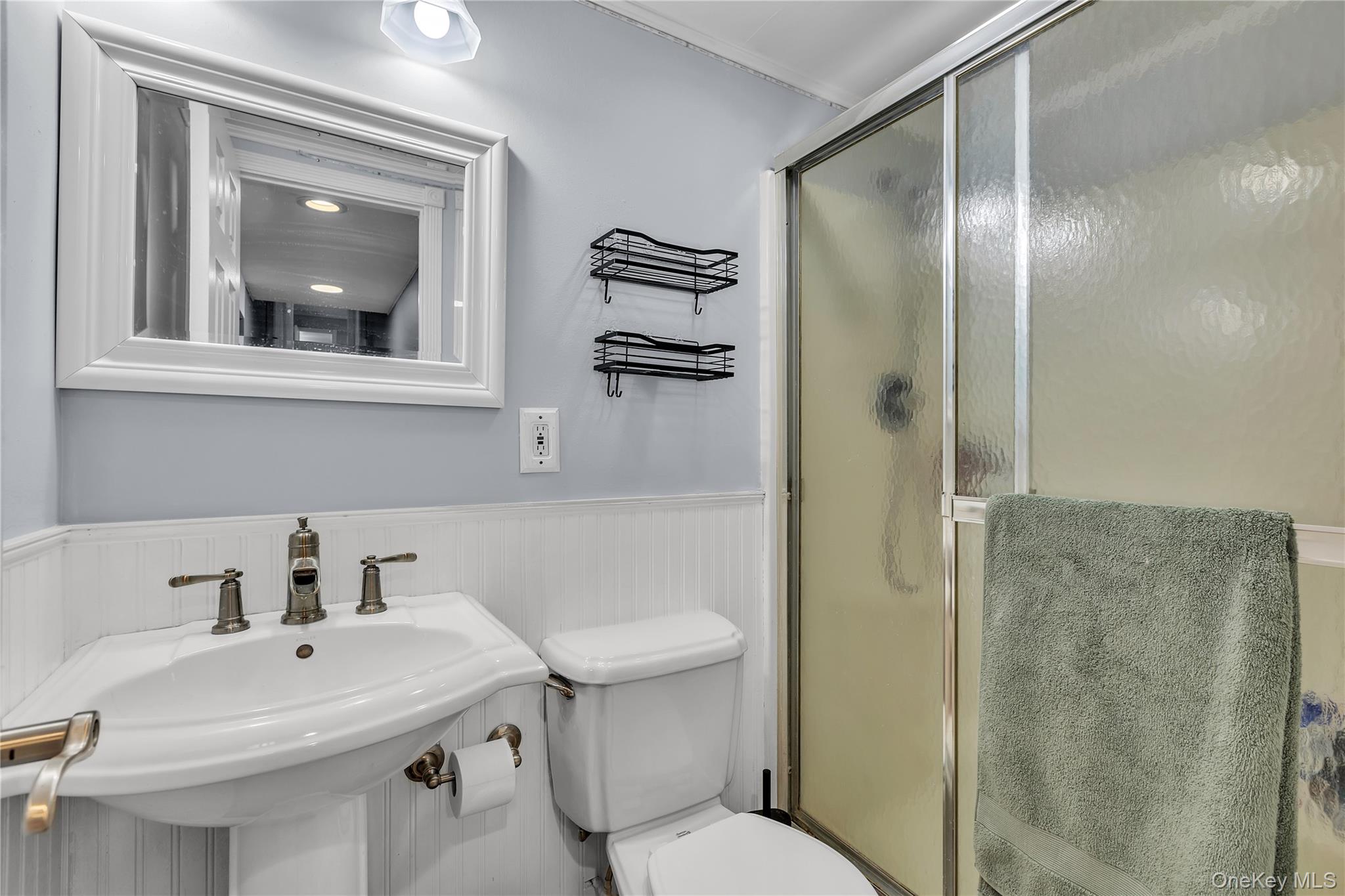 297 Church Road Putnam Valley, NY 10579 - Photo 28 of 42 a bathroom with a sink toilet and shower